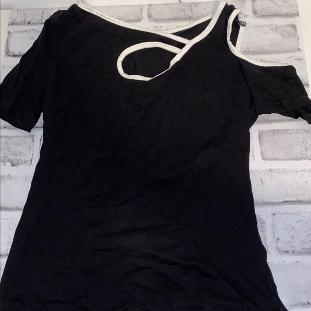 Black shirt with white details and cut outs